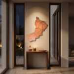 Oman map wall art above a console table in a warmly lit modern entryway