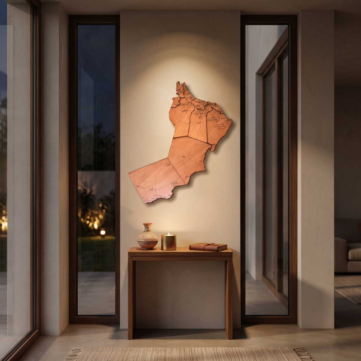 Oman Map Hallway Glamorwood Oman map wall art above a console table in a warmly lit modern entryway