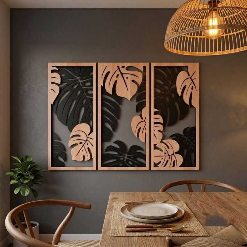 Wooden monstera triptych above a dining table in a warm dining room